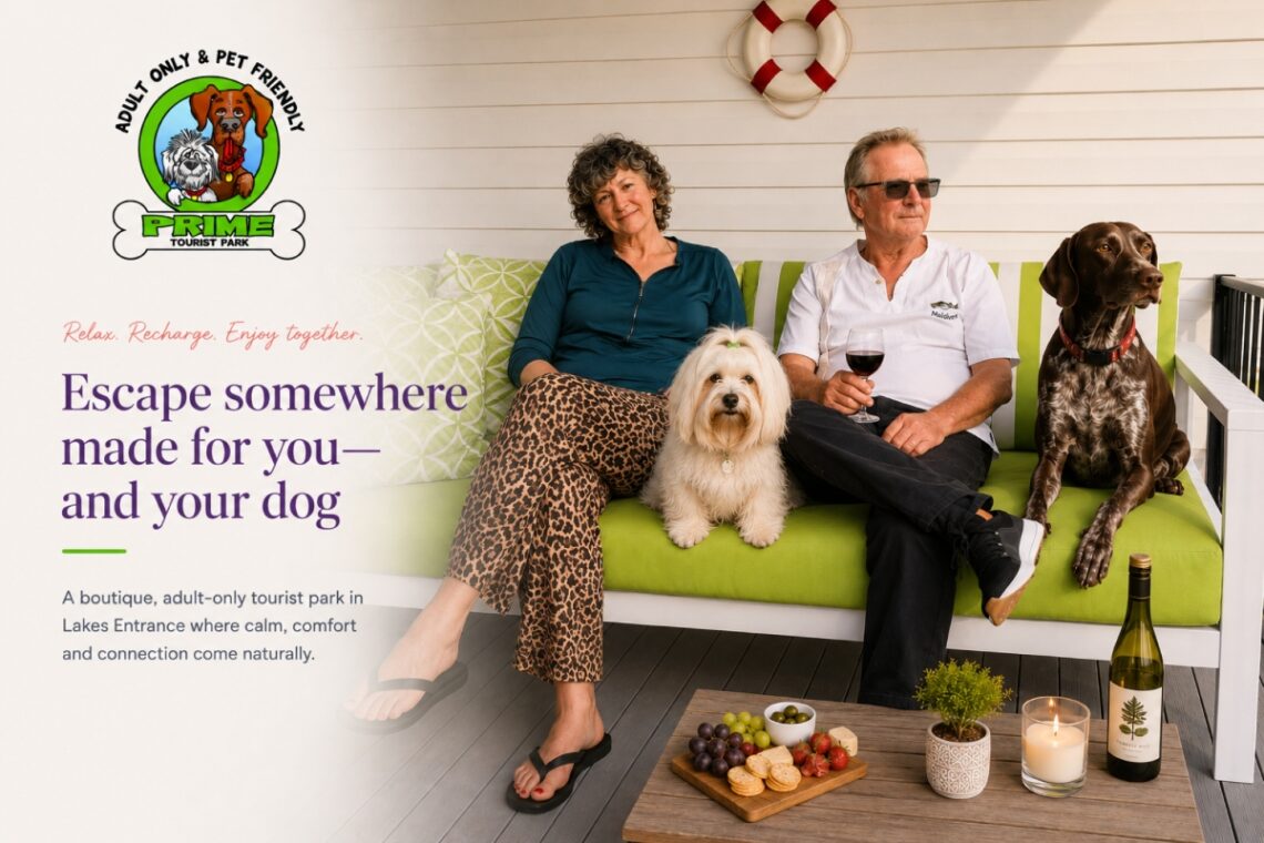 Image of adult couple relaxing on the enclosed deck of a Holiday Cottage with their 2 dogs, at Prime Tourist Park in Lakes Entrance, Victoria.